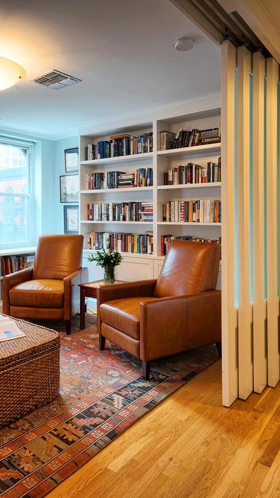 Hudson Design Upper West Side Penthouse interior bookshelves Upper West Side Penthouse